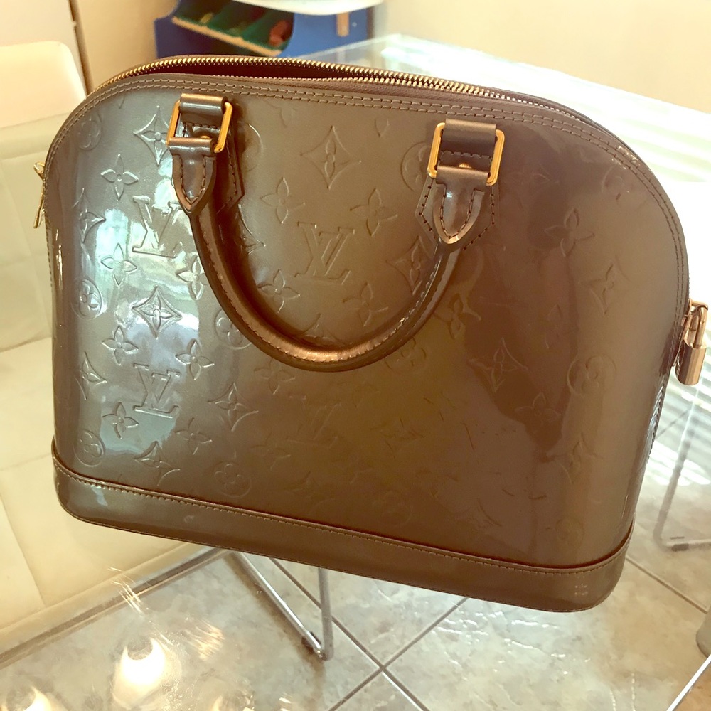 Limited edition silver alma LV bag